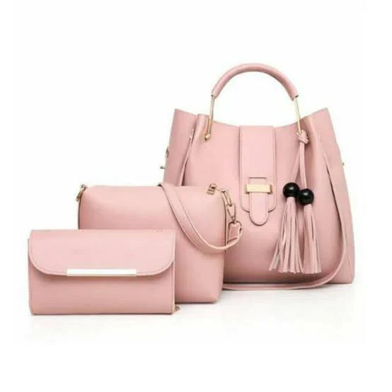 Women's handbag bundle featuring a structured tote, crossbody bag, and wallet in soft pink color.