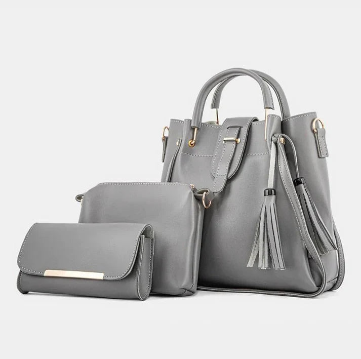 Women's handbag bundle featuring a structured tote, crossbody bag, and wallet in stylish gray.